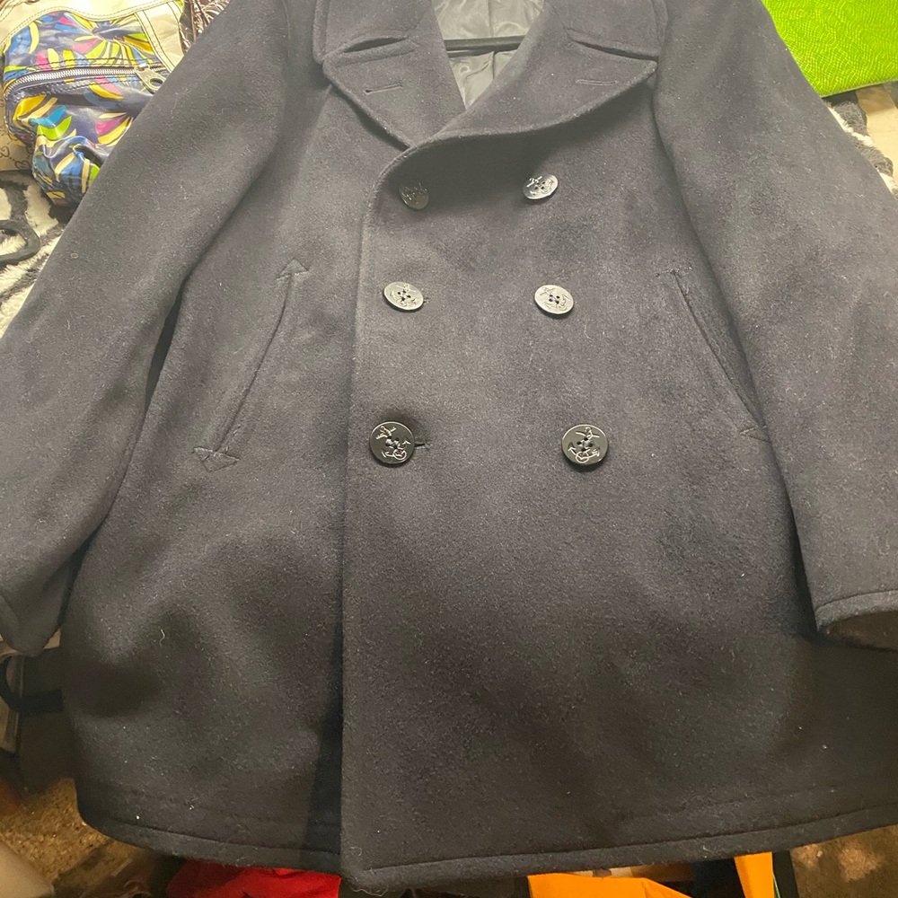 Men 100% wool coat.
